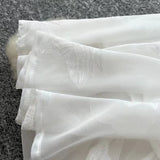 Fashion French High Sense V-neck High Waist Slimming Embroidery White Spaghetti Strap Dress HZ1024